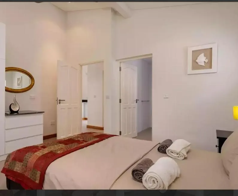 Au Cap Rock Villa Chalet בית הארחה